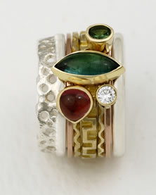 'Stacking Ring' in silver and gold with green Tourmaline, pink Tourmaline, Tsavorite and diamond 